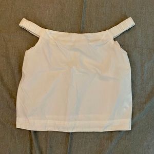 white top with shoulder straps